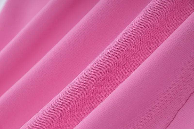 Button-Front Knit Midi Dress with Contrast Trim and Floral Accent